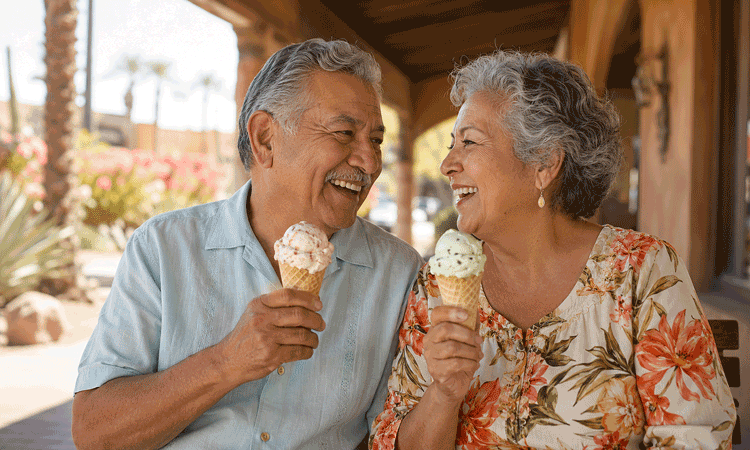 Senior couple in Yuma enjoying ice cream on a hot day after learning what is a cataract from Aiello Eye Institute in Yuma, Arizona.